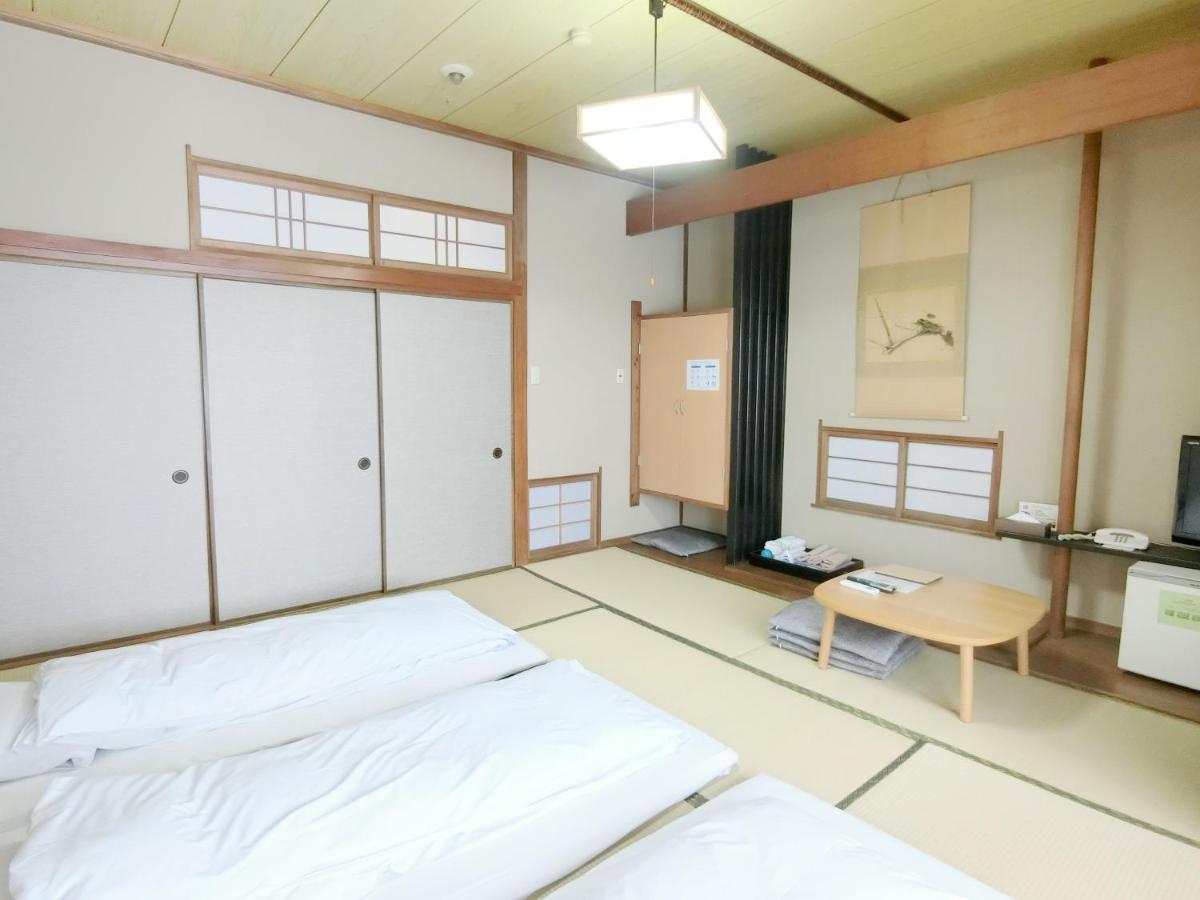 Nogami Honkan Beppu Habitación foto