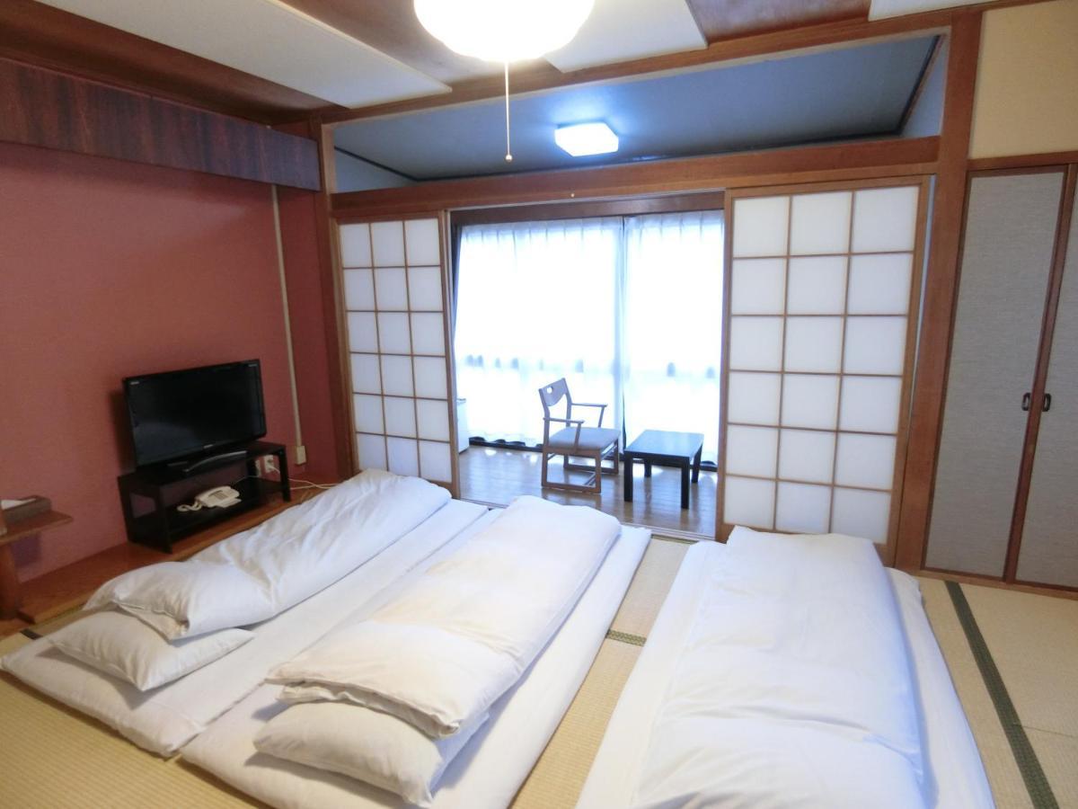 Nogami Honkan Beppu Habitación foto